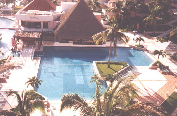 Main pool and swim up bar from upper floor in hotel